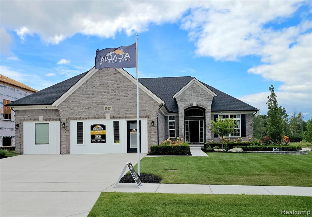 50079 Mustang Drive, Macomb, MI 48042 — front exterior