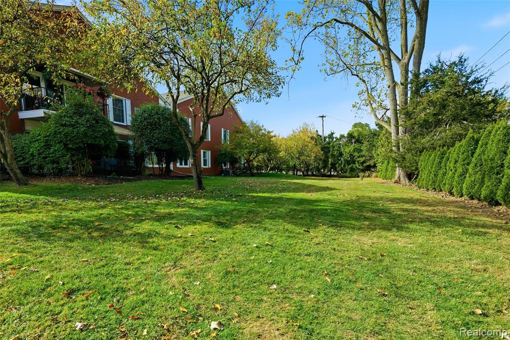 19710 13 Mile Road, 107, Beverly Hills, MI 48025 — front exterior