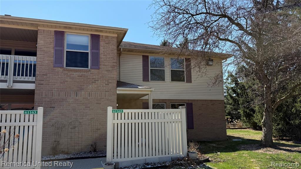61165 Greenwood Drive, 114, South Lyon, MI 48178 — front exterior