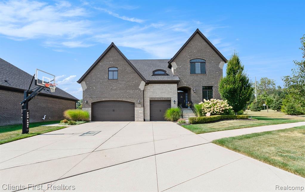 60975 STONECREST Drive, Washington, MI — front exterior