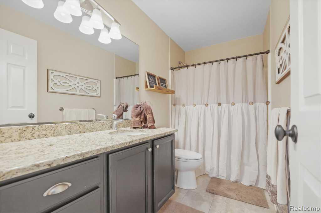 7042 Autumn Wood Drive, Brighton, MI 48116 — Photo 24