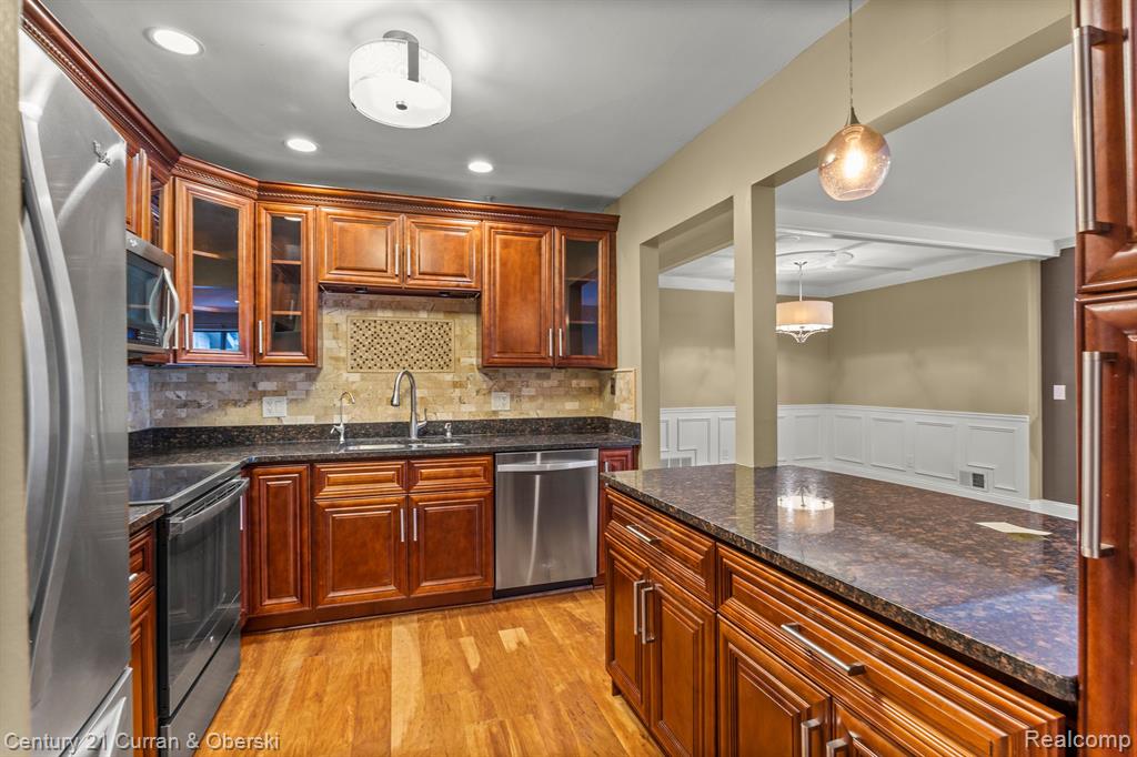 11865 SYCAMORE Drive, 31, Plymouth, MI 48170 — Photo 16