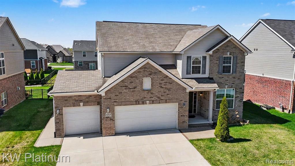 55321 Demaret Drive, Macomb, MI 48042 — front exterior