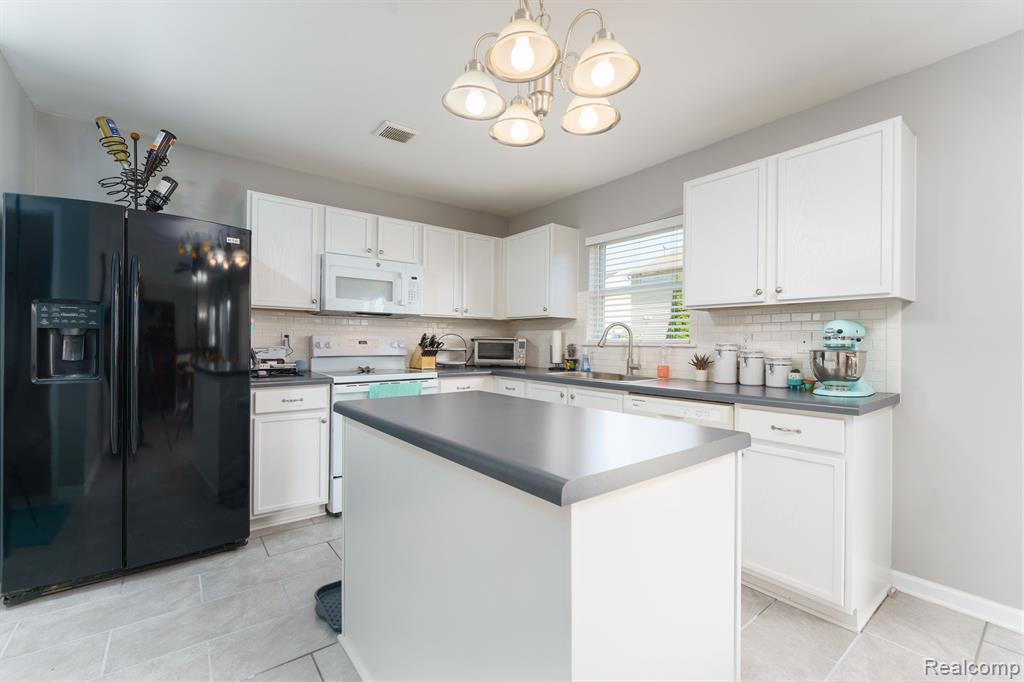 8620 RIFLE RIVER Drive, Fowlerville, MI 48836 — Photo 11