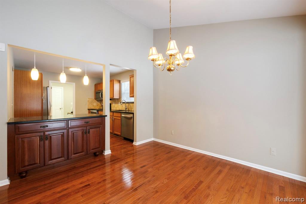 671 Woodhaven Drive, Commerce Twp, MI 48390 — Photo 14