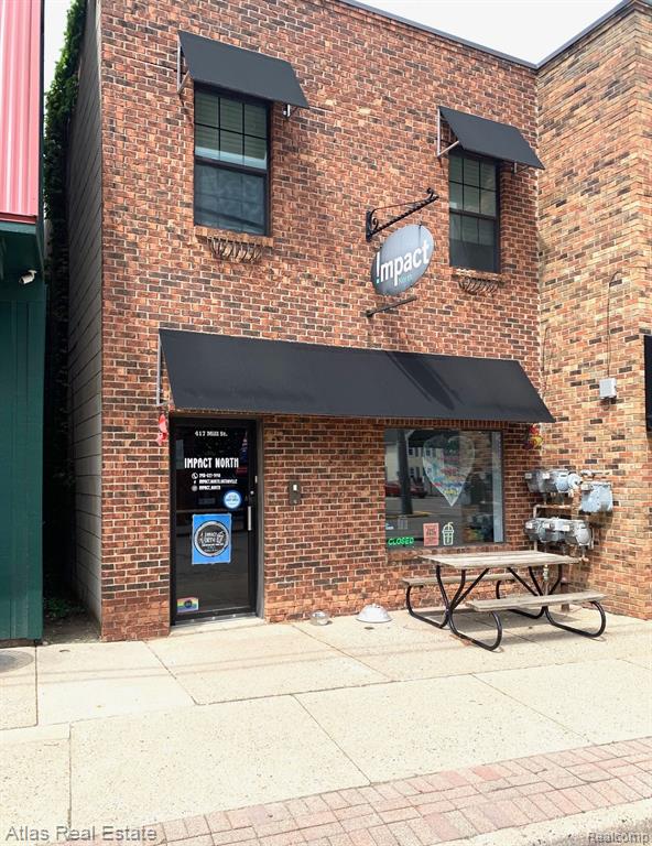 417 Mill St, Ortonville, MI — front exterior