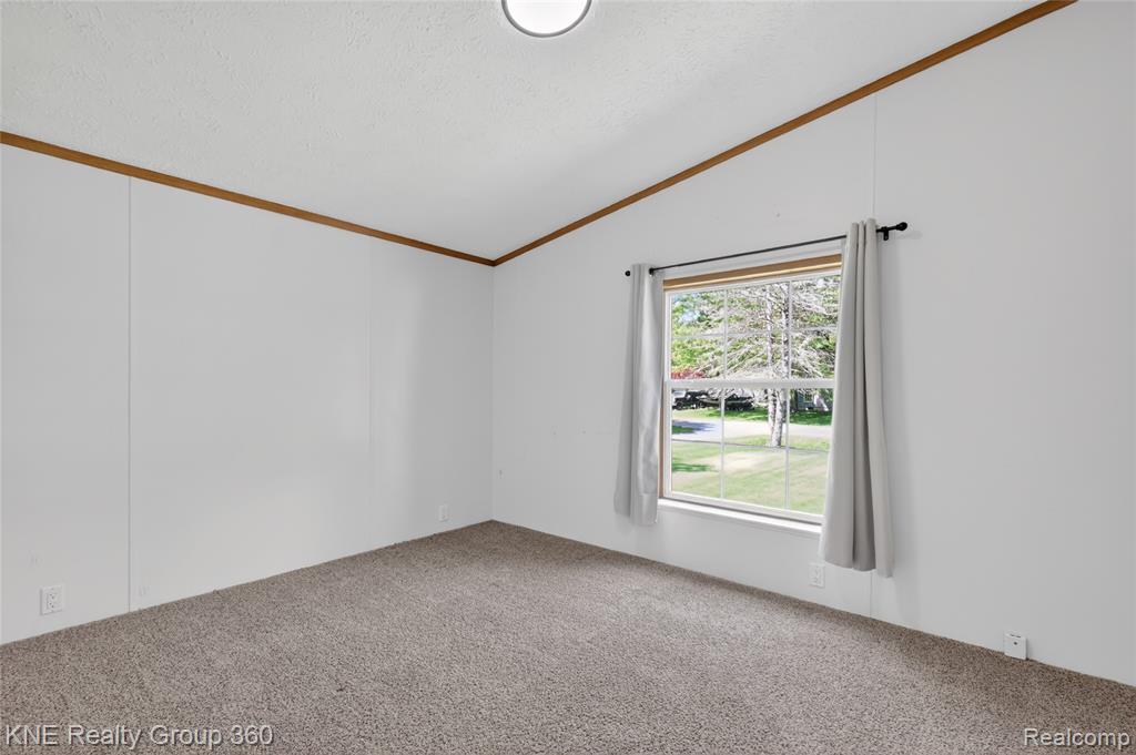 672 Red Oaks Drive, Howell, MI 48843 — Photo 25