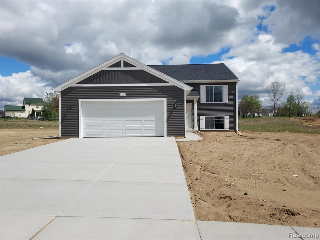 8120 Towas Lane, Fowlerville, MI 48841 — front exterior