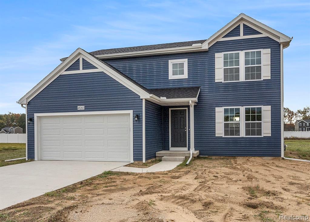 8127 Moonlight Creek Lane, Fowlerville, MI 48836 — front exterior