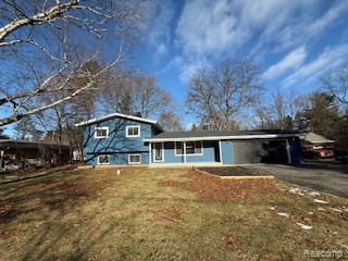 6111 Woodmoor Drive, Burton, MI 48509 — front exterior