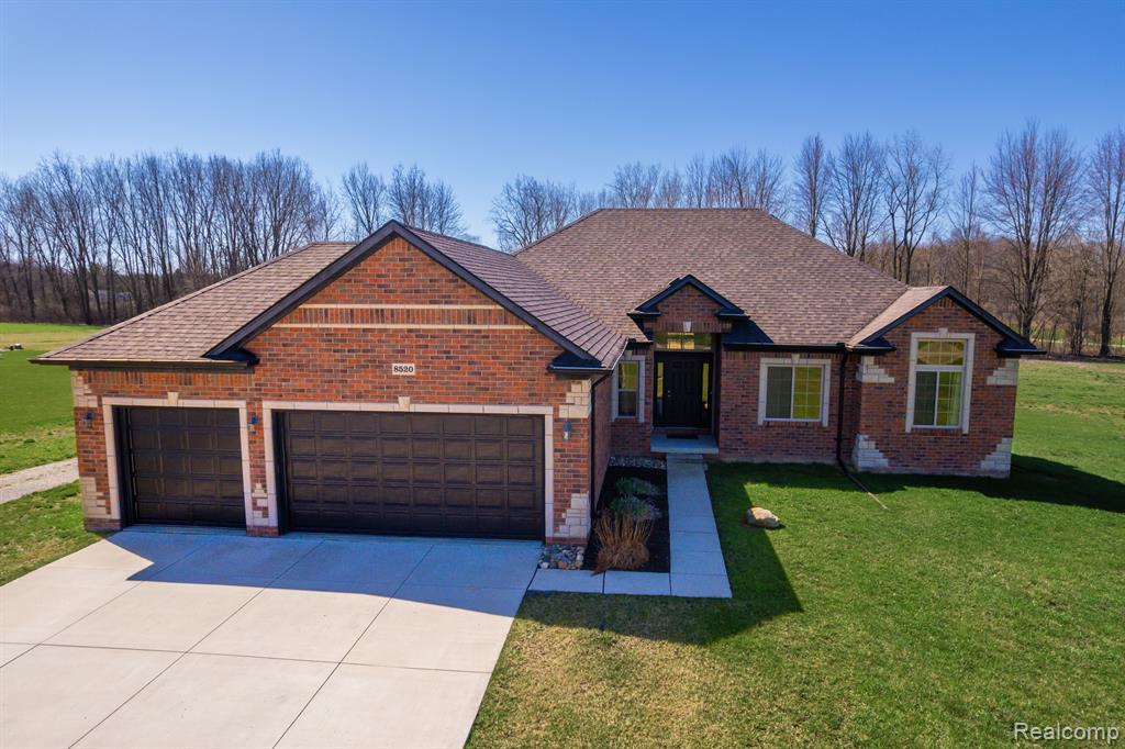 8520 ALMONT Road, Almont, MI 48003 — front exterior