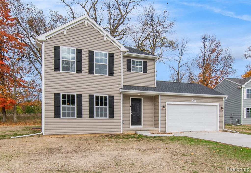 204 Kingsberry Drive, Blissfield, MI 49228 — front exterior