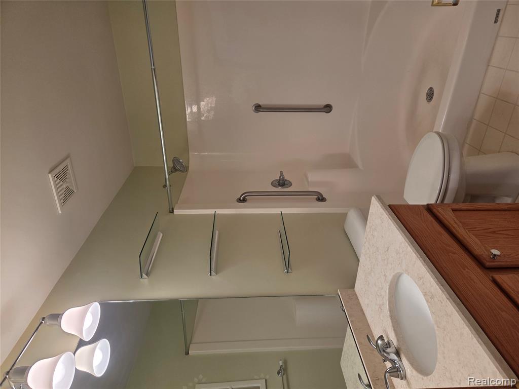 6102 Doveplum Drive, Brighton, MI 48116 — Photo 18