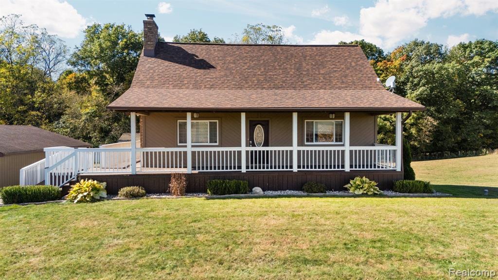 1131 N SEARLS Road, Webberville, MI 48892 — front exterior