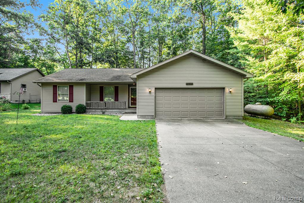 7413 W Nestel Road, Houghton Lake, MI 48629 — front exterior