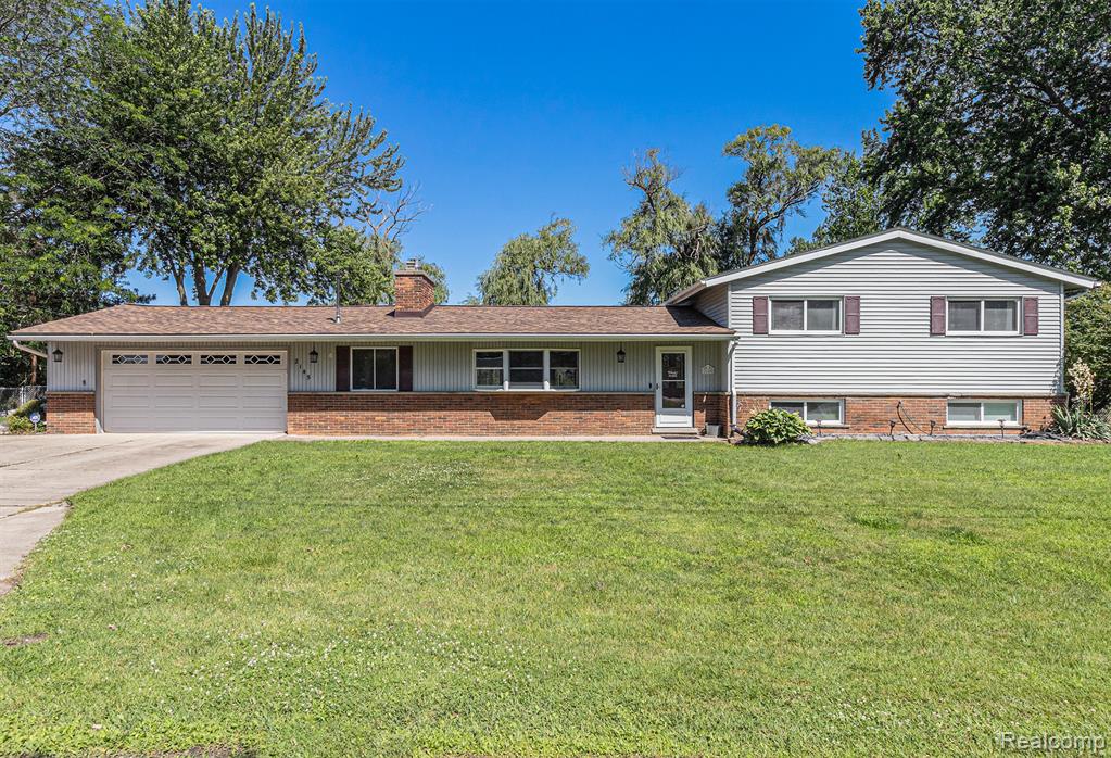 2145 Helmsford Drive, Wolverine Lake, MI 48390 — front exterior