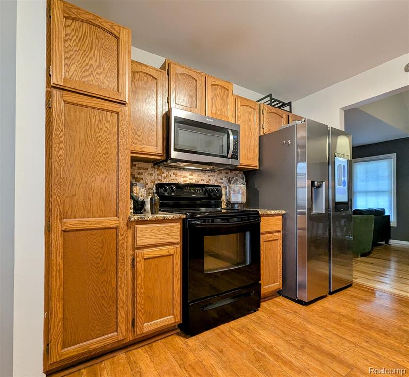 840 Woodridge Hills Drive, Brighton, MI 48116 — Photo 38