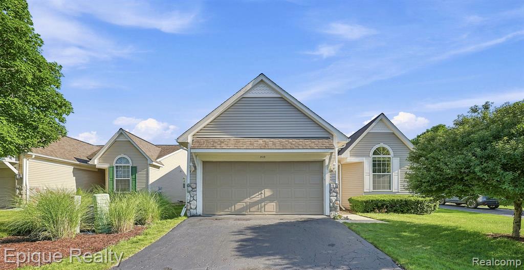 919 Rikki Ann Court, Wixom, MI 48393 — front exterior