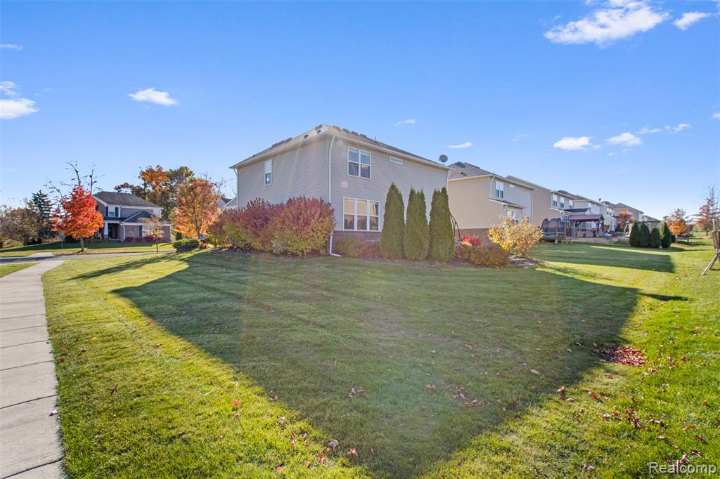 57570 Village Drive, New Hudson, MI 48165 — Photo 42
