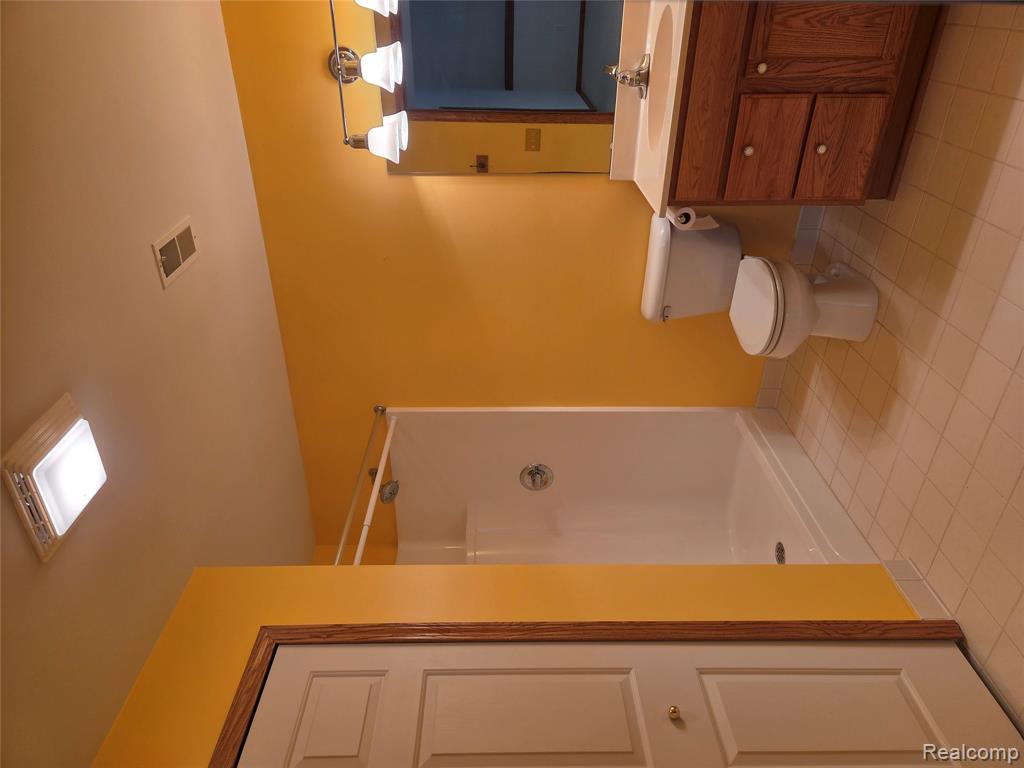 6102 Doveplum Drive, Brighton, MI 48116 — Photo 23