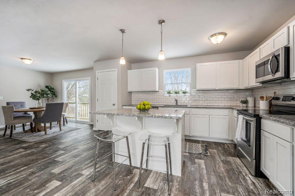 8127 Moonlight Creek Lane, Fowlerville, MI 48836 — Photo 32