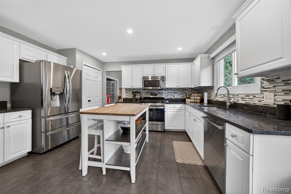 1427 Trailside Boulevard, Wixom, MI 48393 — Photo 15