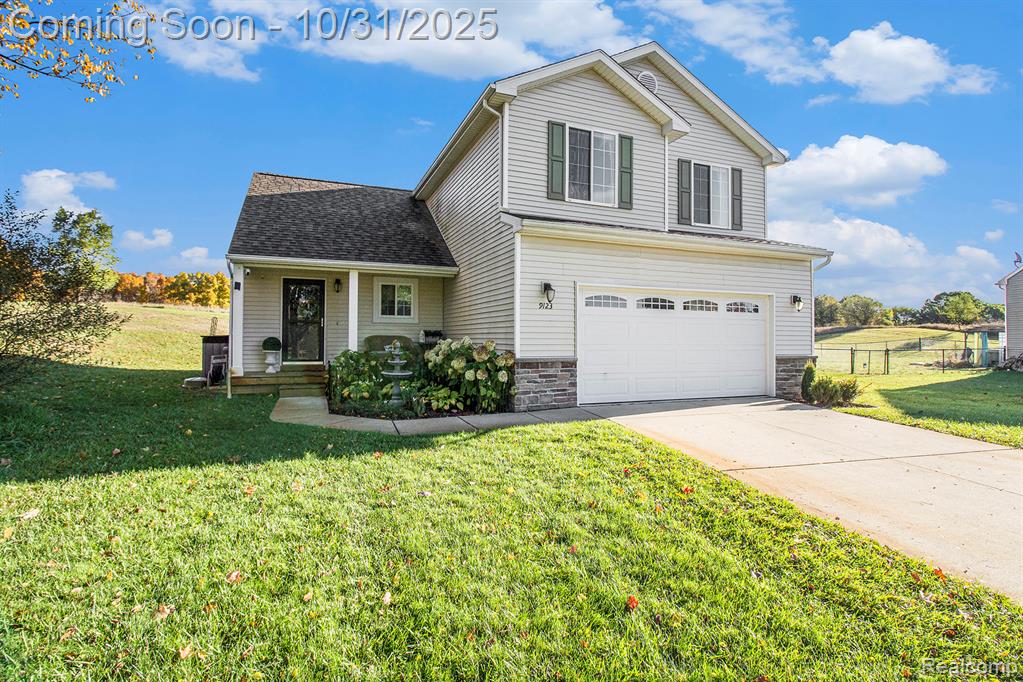 9123 Oneida Way, Pinckney, MI 48169 — front exterior