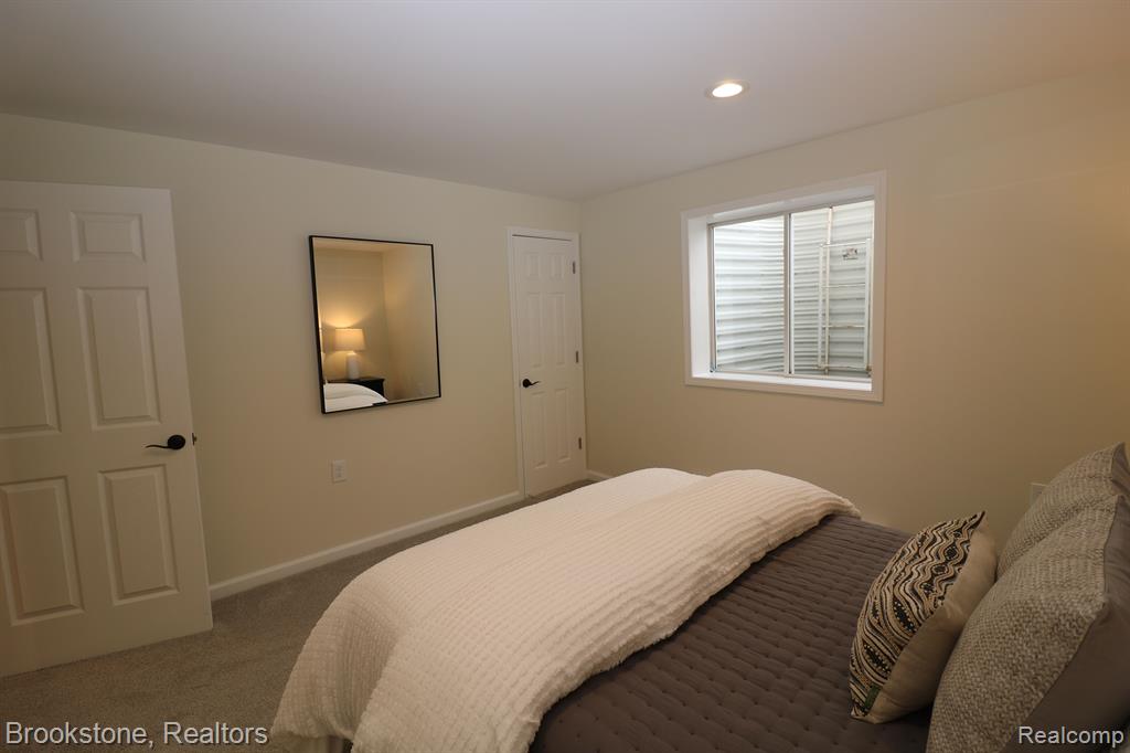 395 GENEVA Court, Howell, MI 48855 — Photo 28