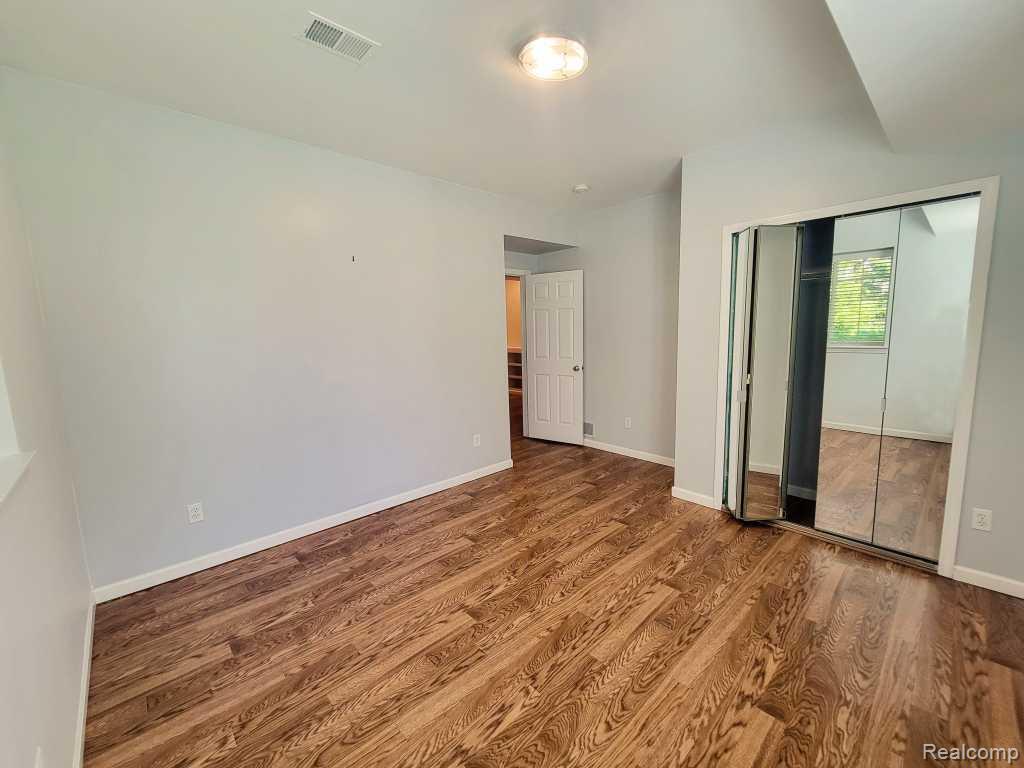 124 Champlain Boulevard, Howell, MI 48843 — Photo 39