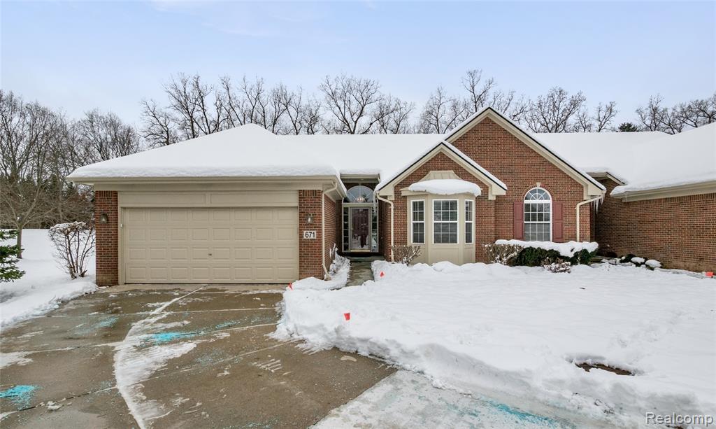 671 Woodhaven Drive, Commerce Twp, MI 48390 — front exterior