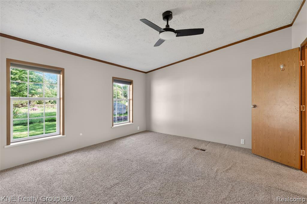 672 Red Oaks Drive, Howell, MI 48843 — Photo 16