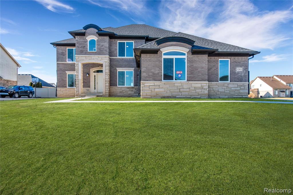 18792 Meloche Drive, Brownstown, MI — front exterior