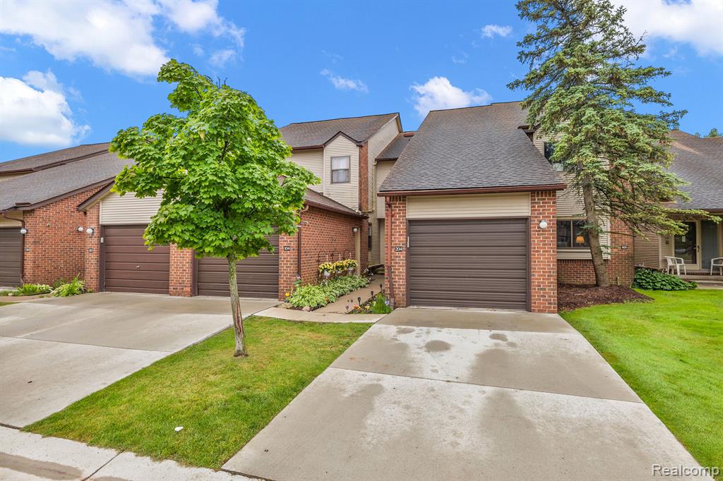 6660 RIDGEFIELD Circle, Unit #204, West Bloomfield, MI — front exterior