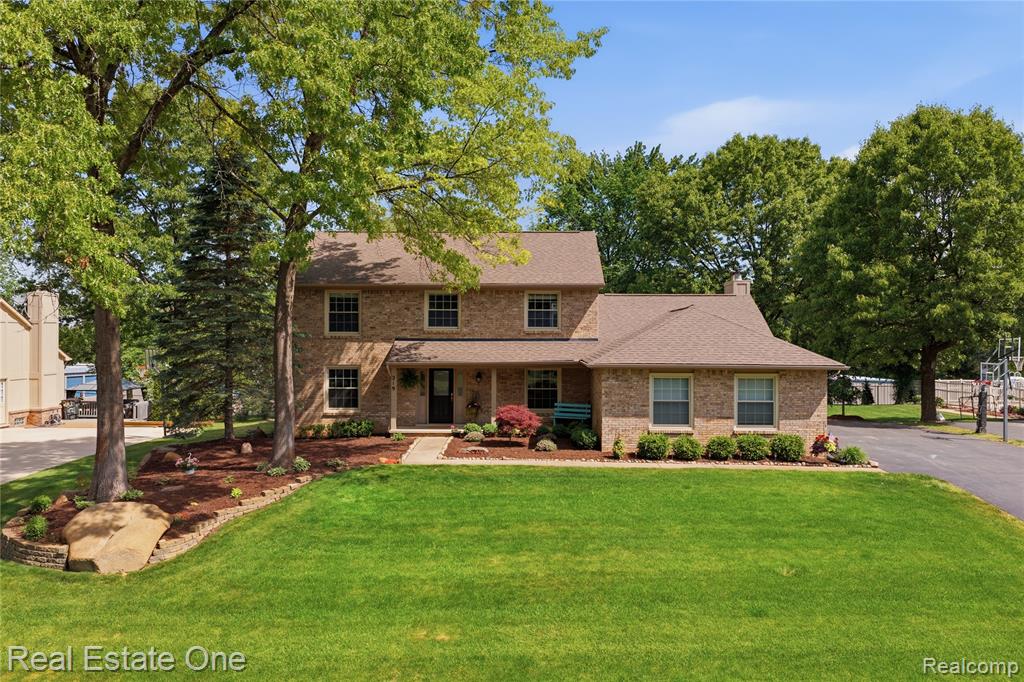 219 Briarwood Drive, Highland, MI — front exterior