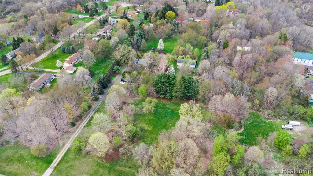 7107 E HIGHLAND Road, Howell, MI 48843 — Photo 4