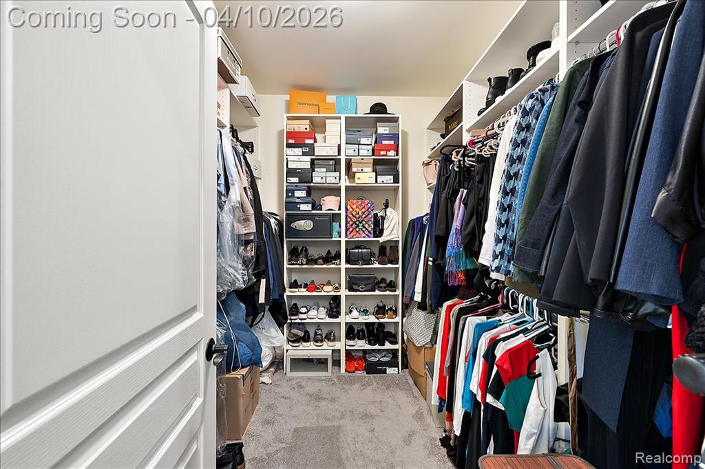 First Floor Primary Suite En-Suite Walk-in Closet