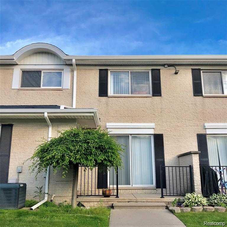 8564 Hampshire Drive, Sterling Heights, MI 48313 — front exterior