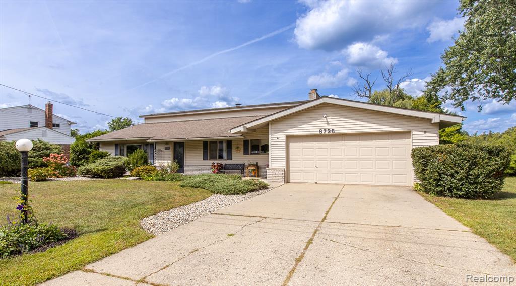 8726 Sandy Crest Drive, White Lake, MI — front exterior