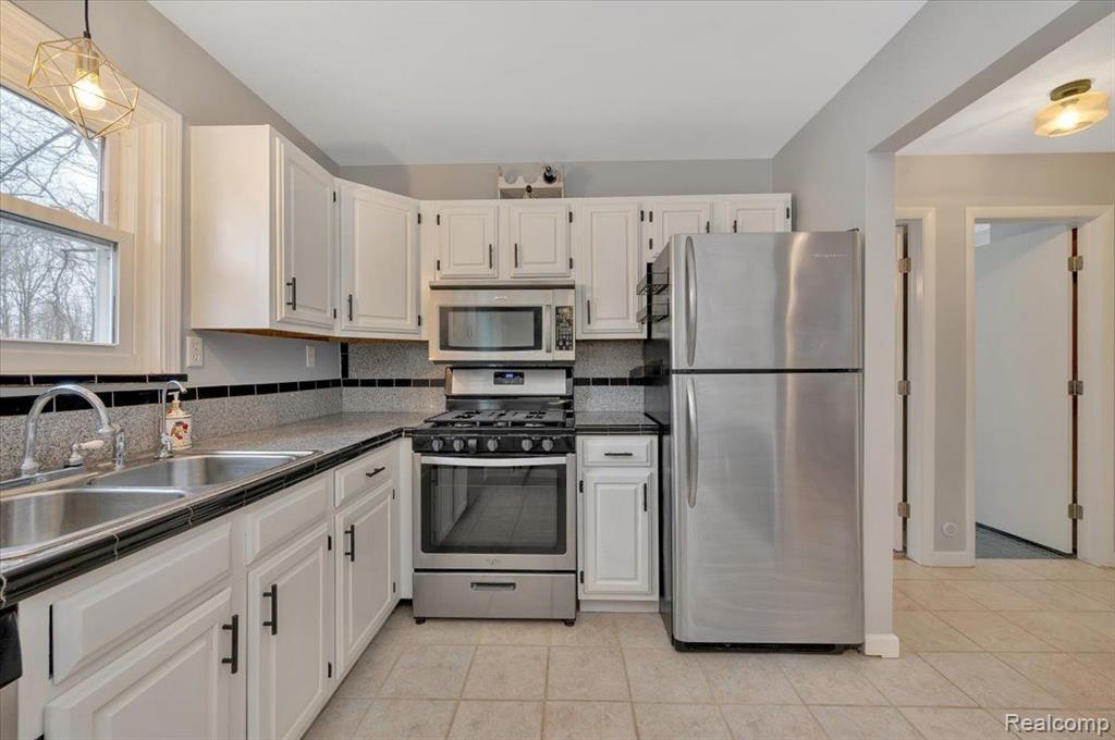 8716 CURRIE Road, Northville, MI 48168 — Photo 12