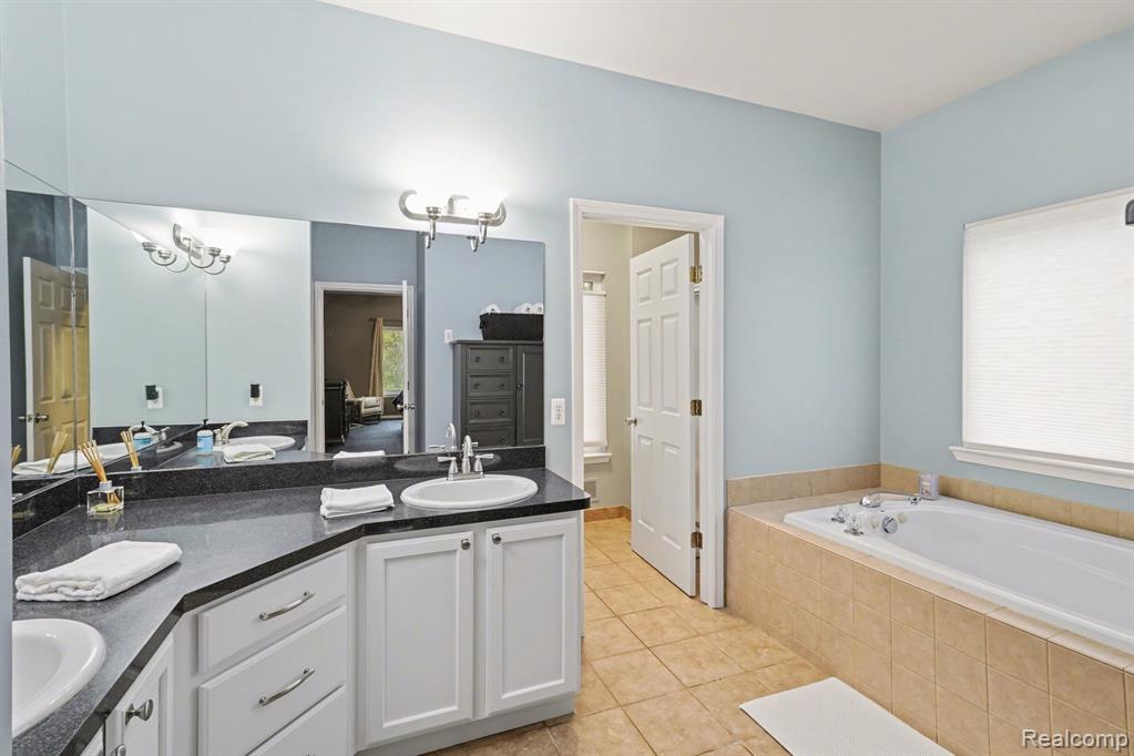 1865 Elkridge Circle, Highland, MI 48356 — Photo 10
