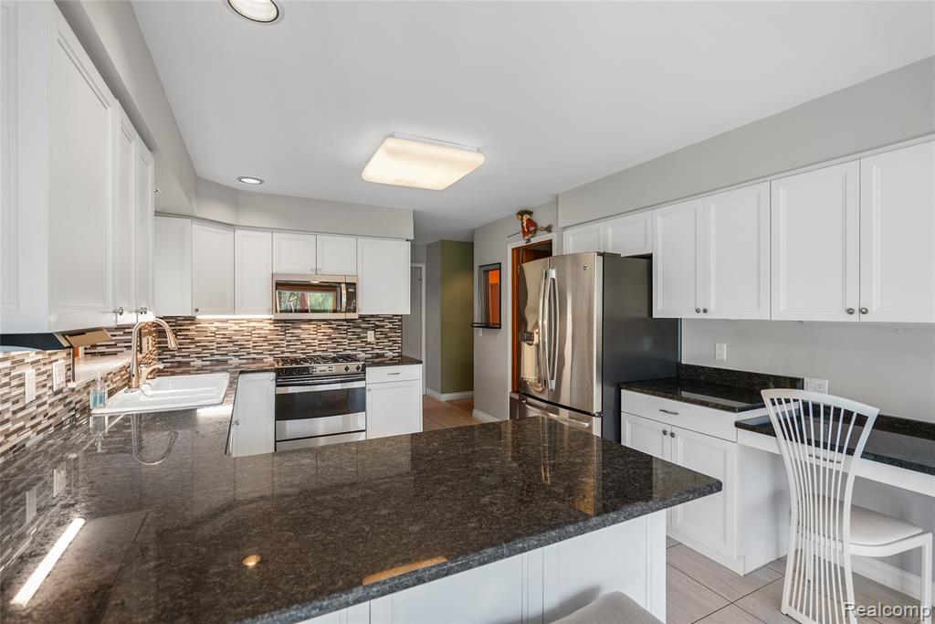 990 Brewer Road, Leonard, MI 48367 — Photo 16