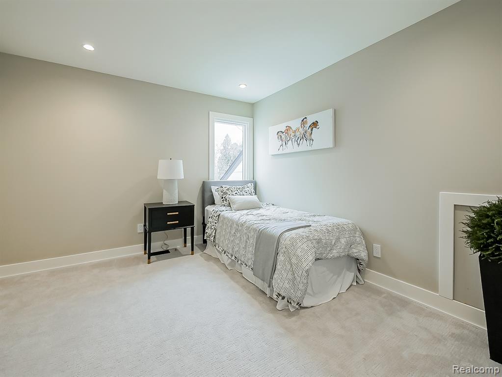 Bedroom featuring carpet flooring and recessed lighting