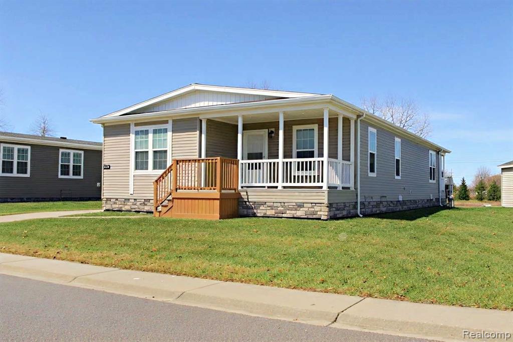 8447 S Brookston Drive, Willis, MI 48191 — front exterior