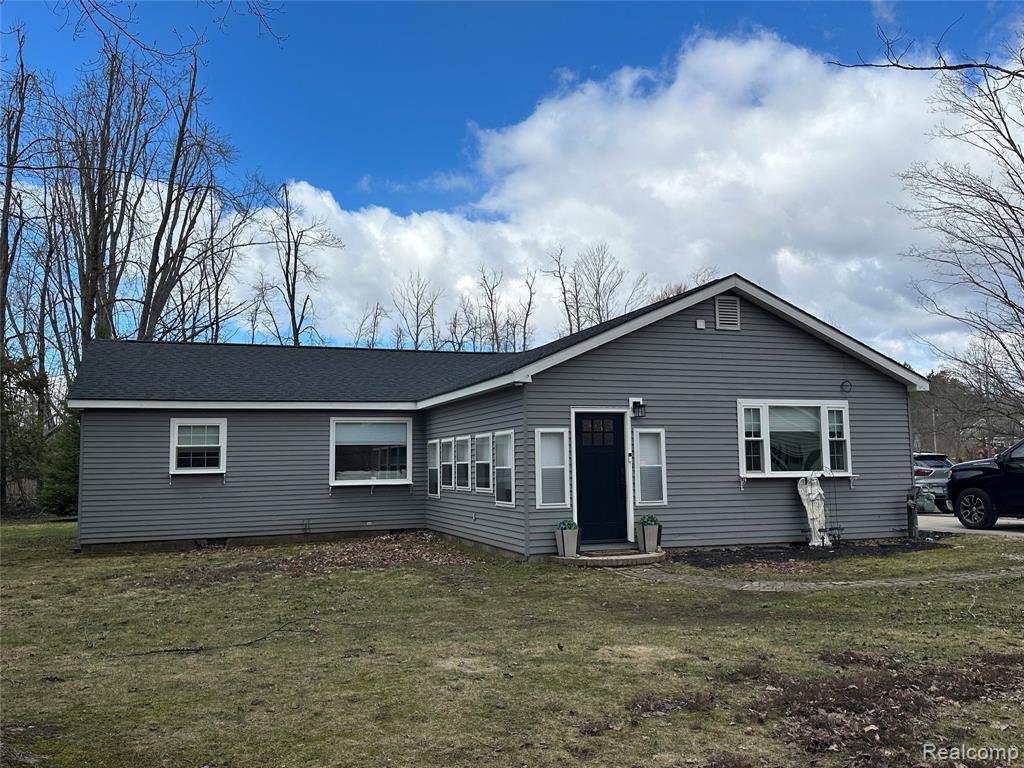 7726 Lake Street, Alanson, MI 49706 — front exterior