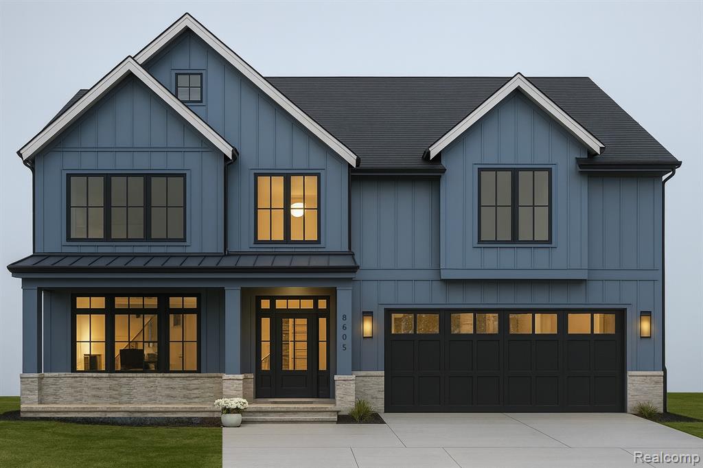 Modern farmhouse featuring board and batten siding, an attached garage, concrete driveway, covered porch, and a metal roof