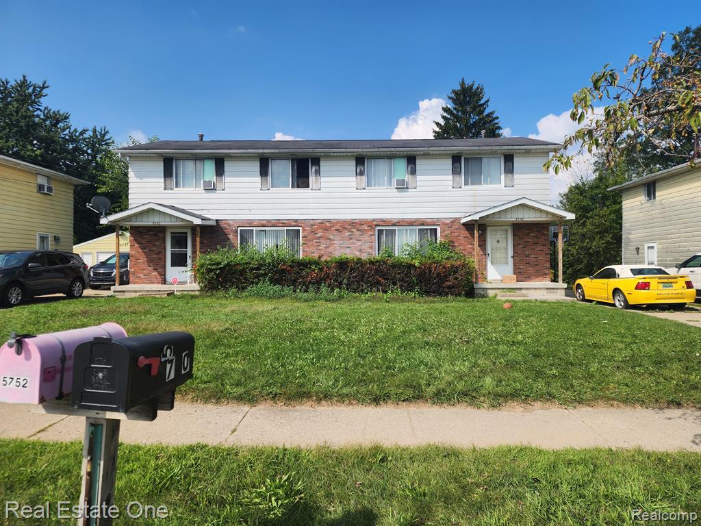 5750/5752 ORCHARD Court, Lansing, MI 48911 — front exterior