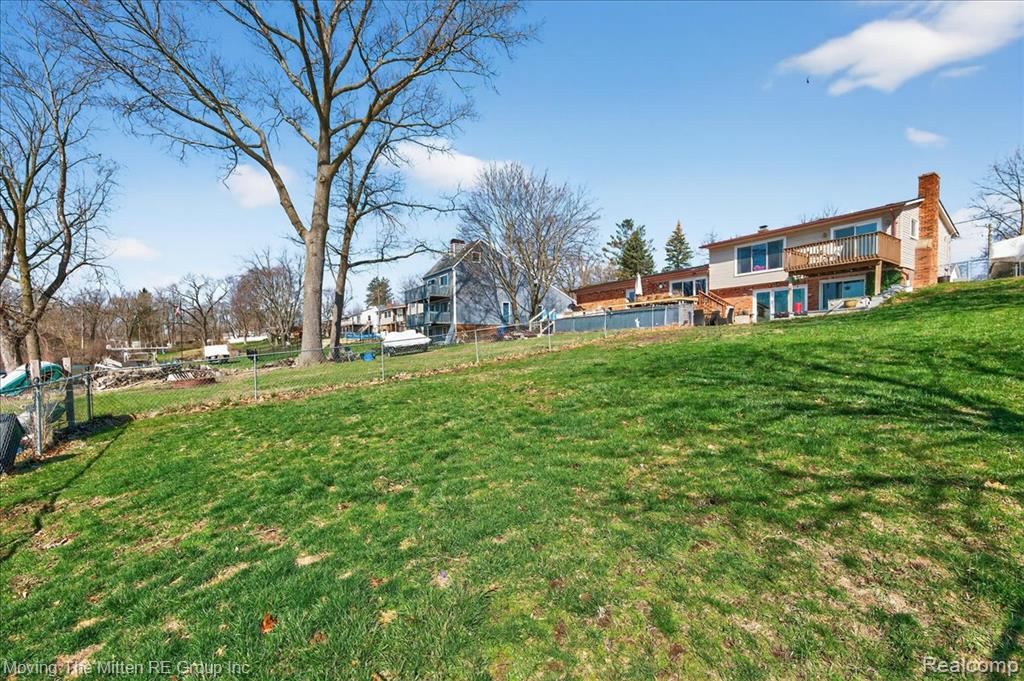 View of yard with a deck