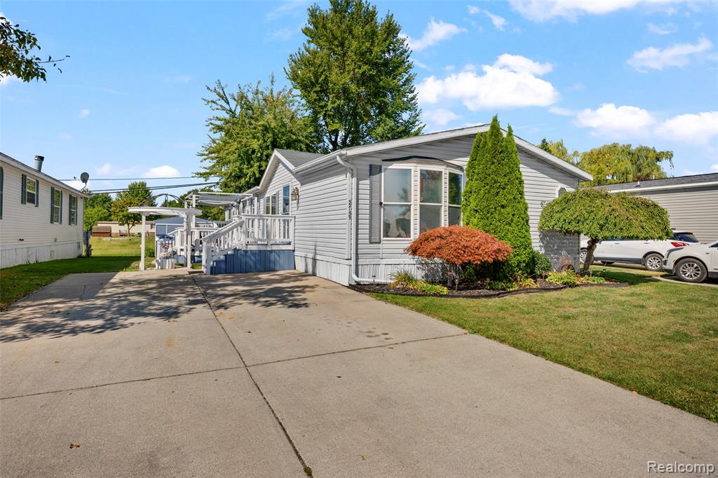 52159 Landsdowne Circle, Chesterfield, MI — front exterior