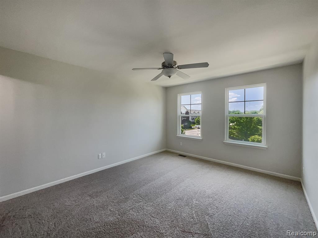 242 CENTER Boulevard, Wixom, MI 48393 — Photo 14