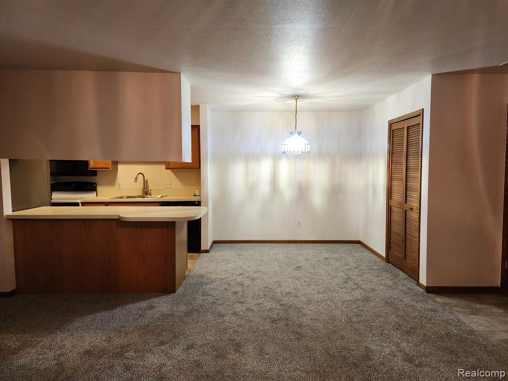 1595 HARBOUR Boulevard, 153, Trenton, MI 48183 — Photo 3